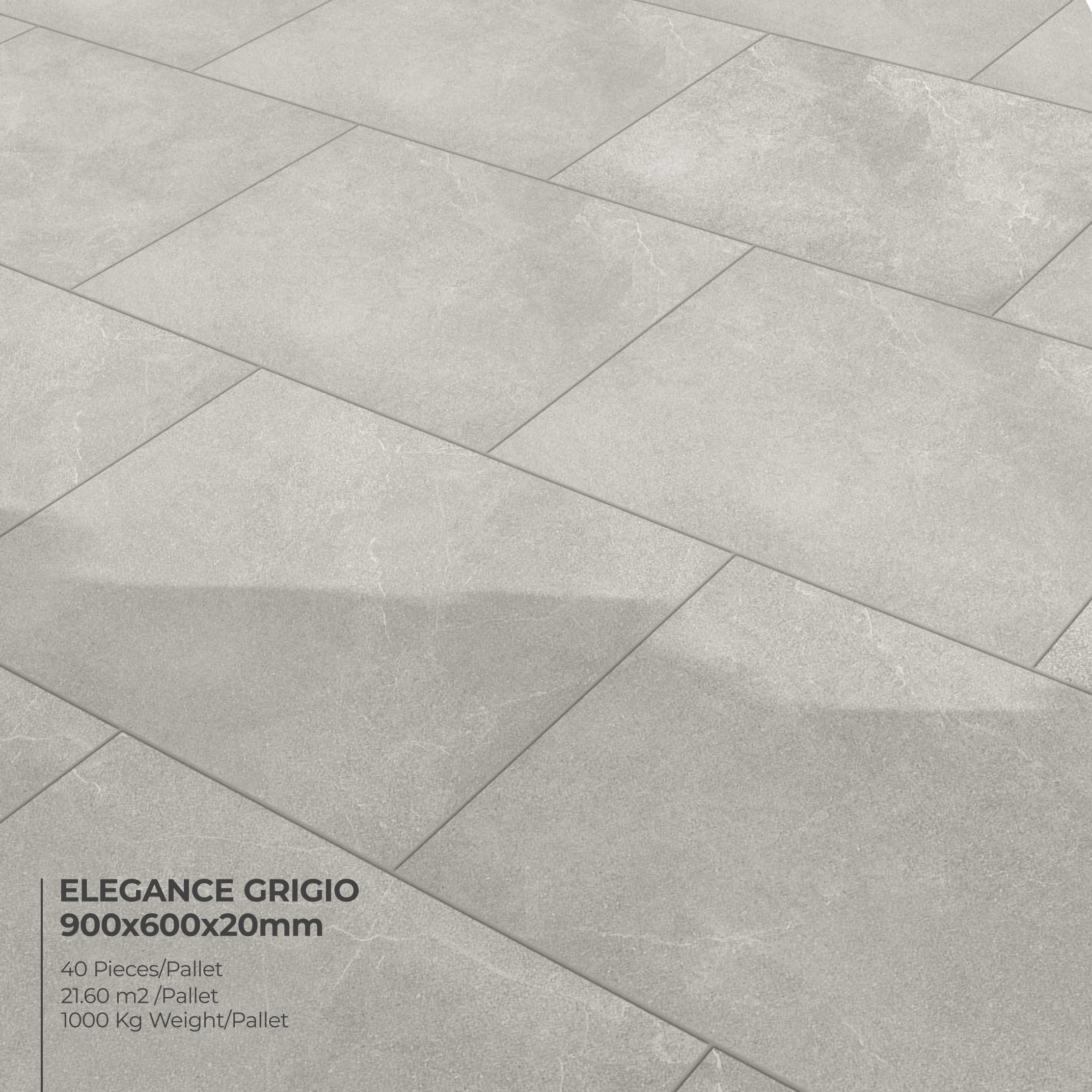 Rectangular light grey stone-effect tiles with a subtle marbled pattern are laid in a staggered design. Text reads 