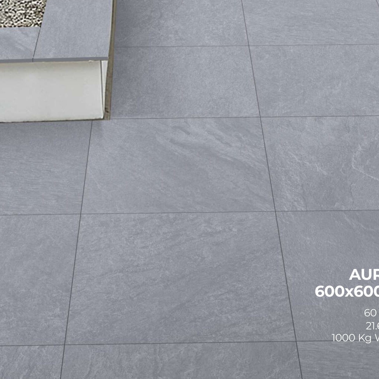 Large grey Aura Grey Porcelain 600x600x20mm tiles arranged in a grid on the patio floor. Pair with Aura Beige Porcelain 600x600 for versatile designs.