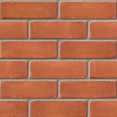 Red brick wall built with Leicester Stock Red 65mm bricks, arranged in neat horizontal and vertical rows with light gray mortar joints for a clean, uniform look.