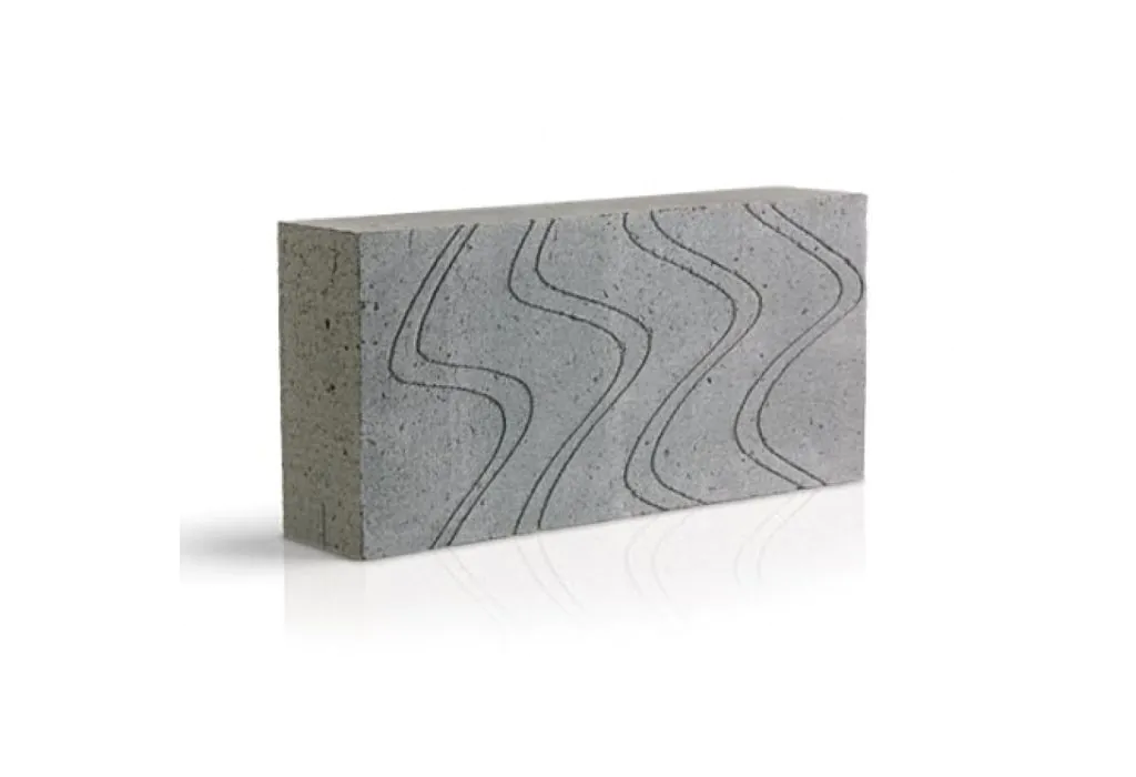 A single THERMALITE AERATED BLOCKS 3.6n with a smooth grey finish and wavy, parallel grooves on one side is displayed against a white background.