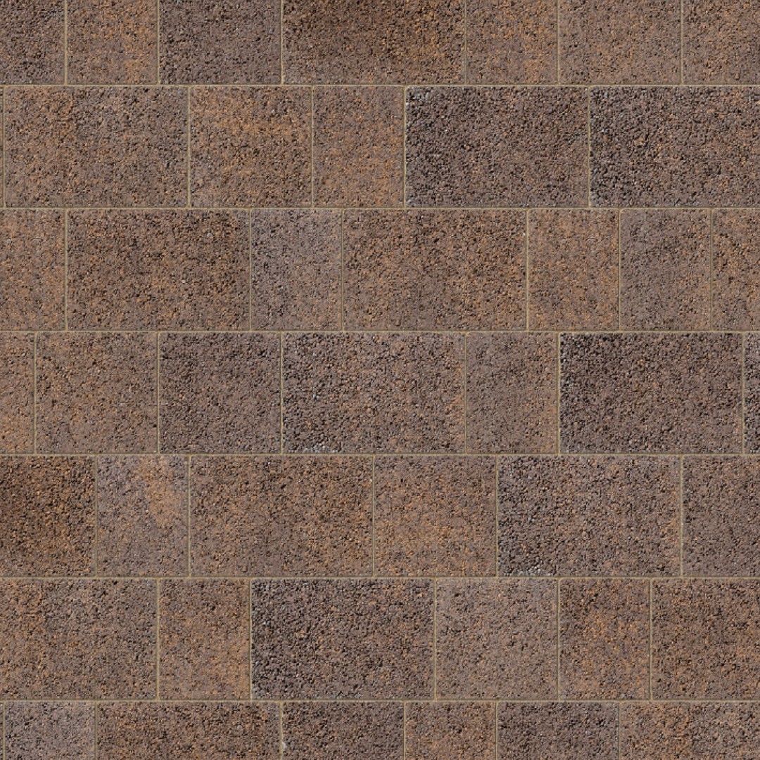A close-up of a wall built with Kilsaran Lismore 50mm Driveway Curragh Gold shows its staggered layout, textured surface, and natural colour variations for an earthy look.