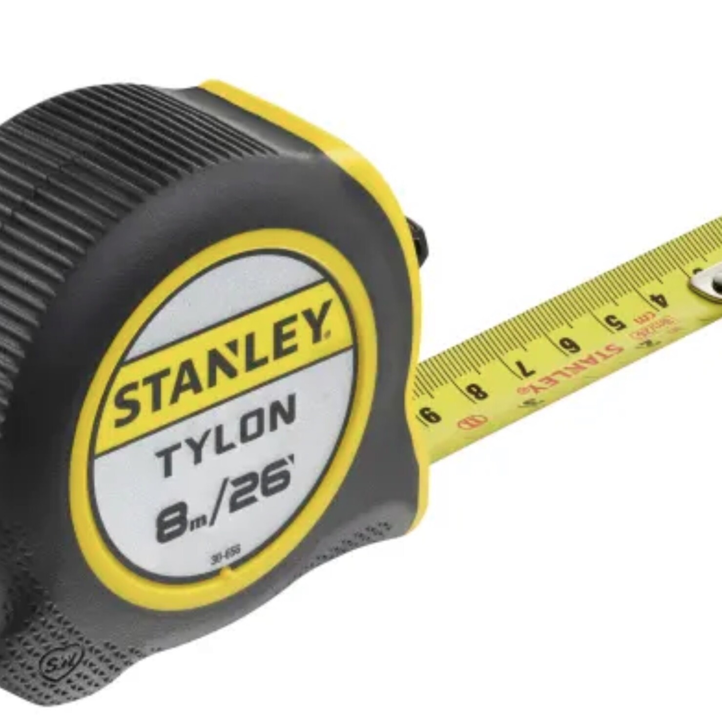 A Tape Measure 8m Stanley Tylon displays a yellow tape extended, featuring measurements in both centimetres and inches. The case is black and yellow with the label